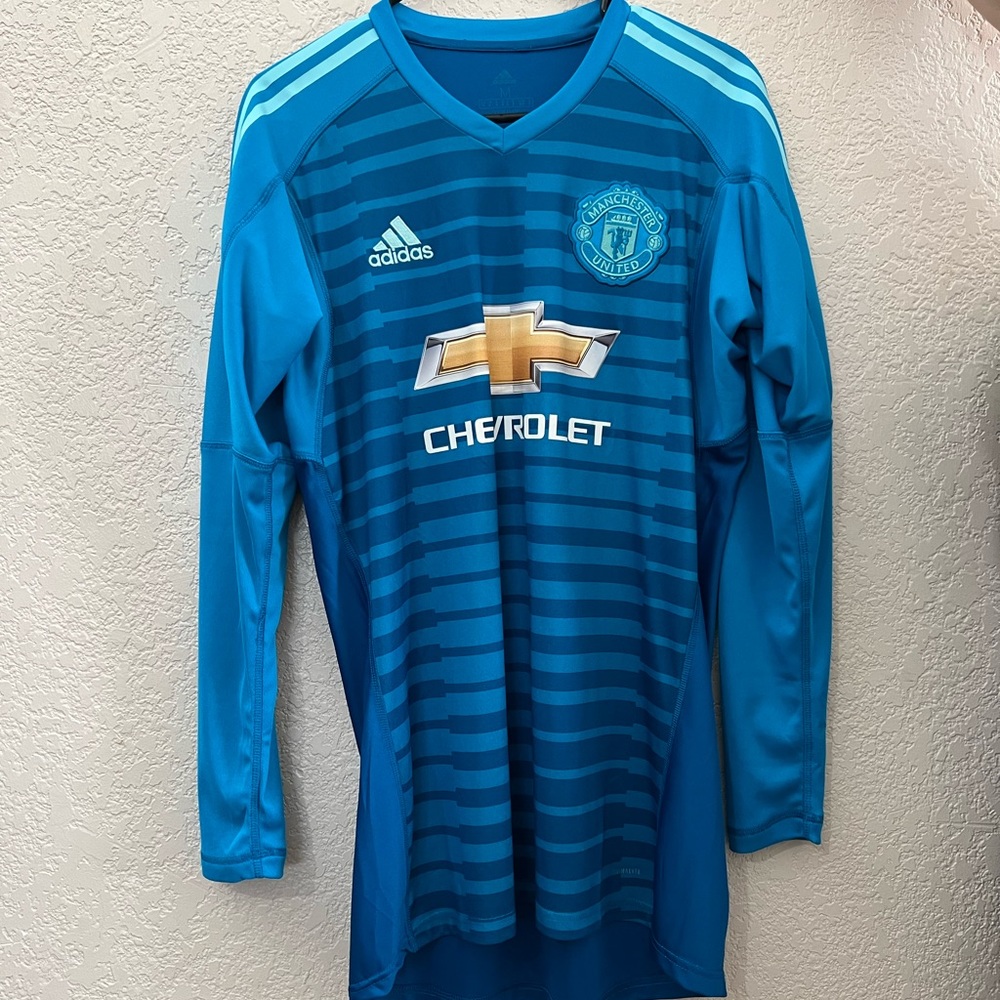 Manchester United team issue goalkeeper jersey.